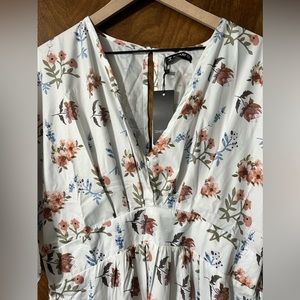 Floral maxi dress with open back slit